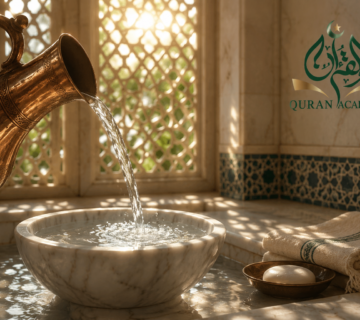 Crystal clear water pouring into a basin, representing the concept of Al-Tahara and ritual purity in Islam